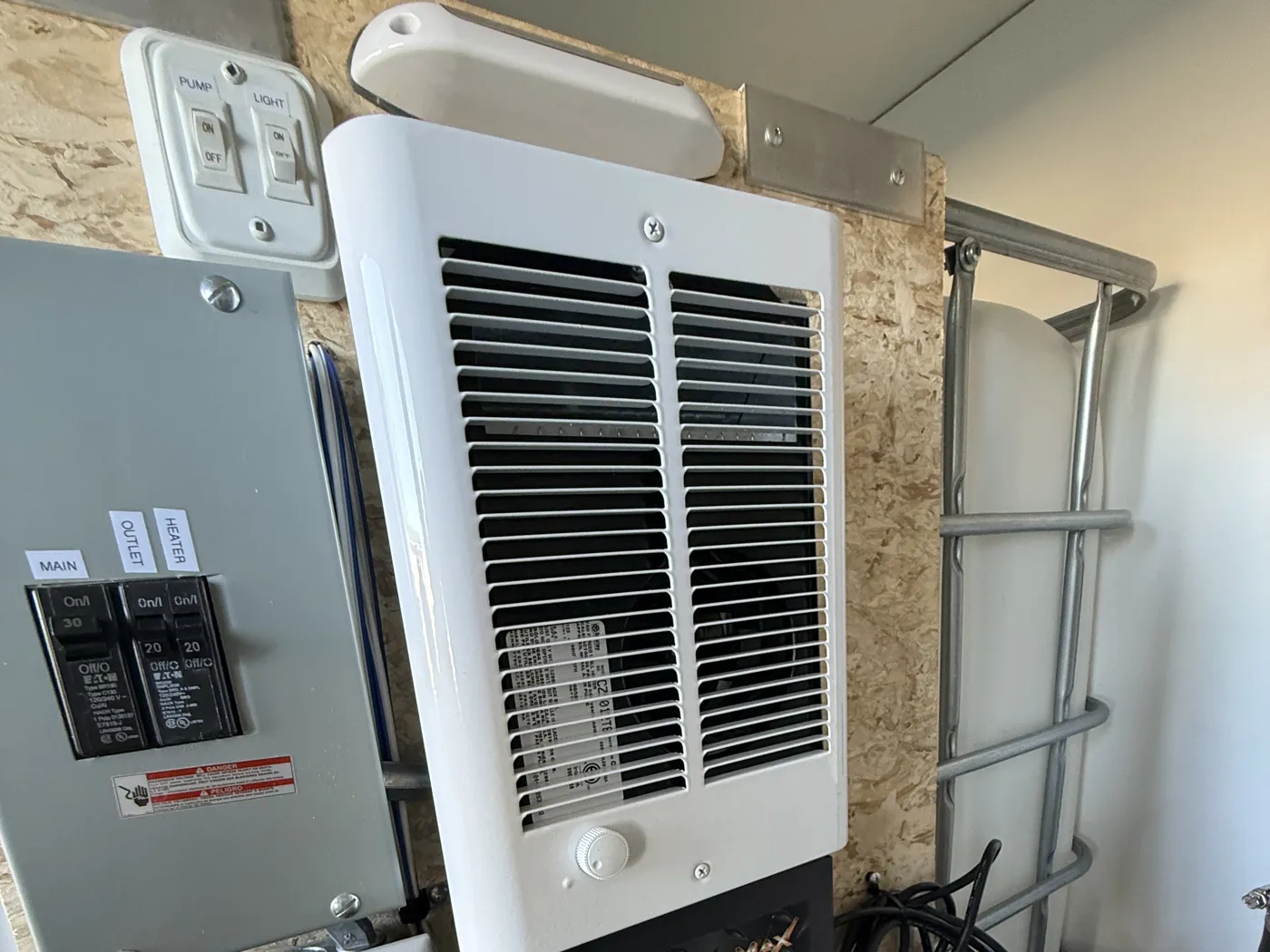 1,000-watt electric heater mounted inside the box
